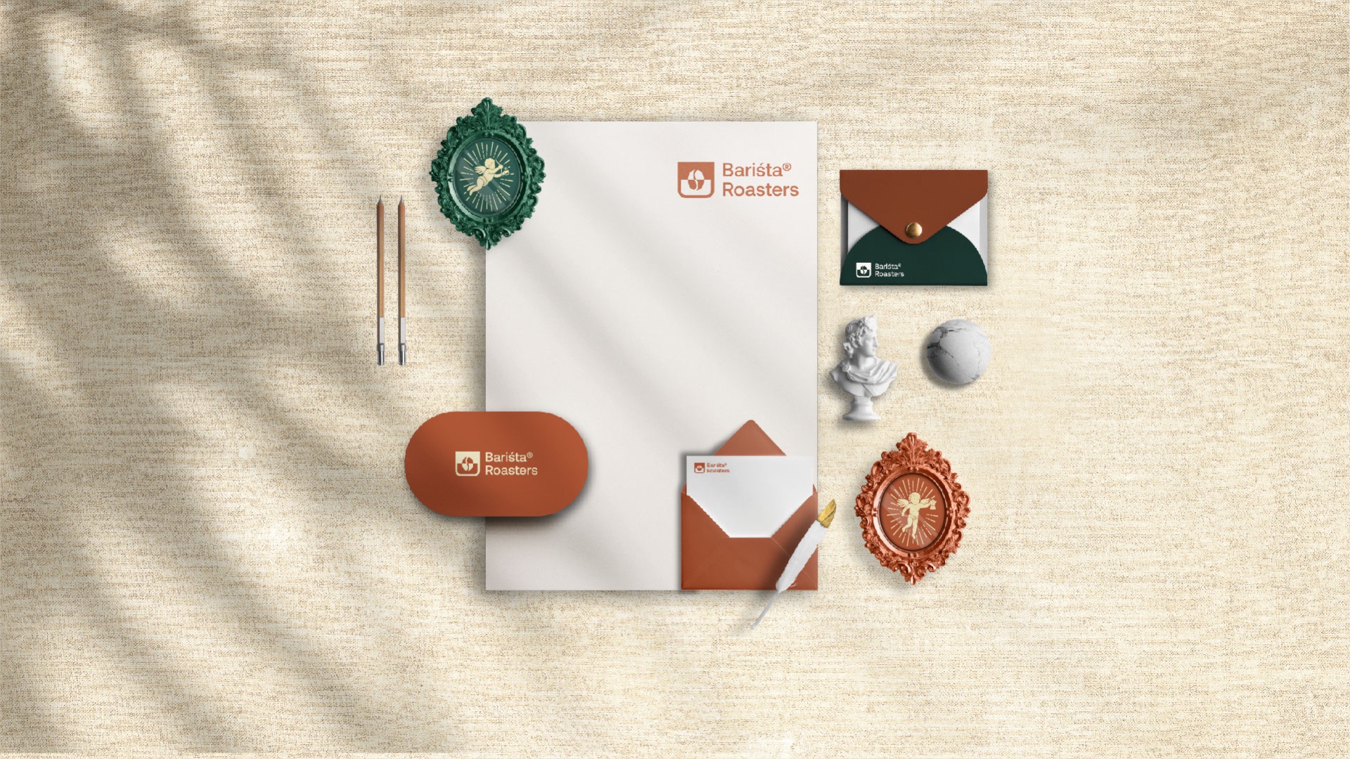 Stationery set with envelopes, a card, wax seals and framed cherub medallions