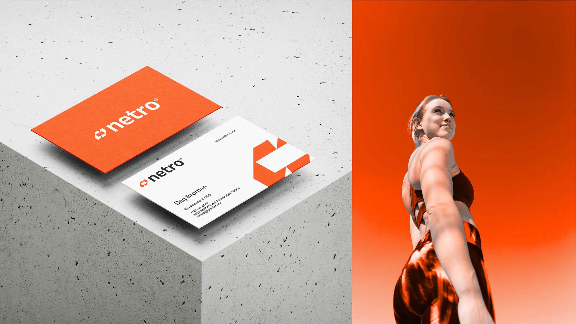 Orange and white business cards on concrete