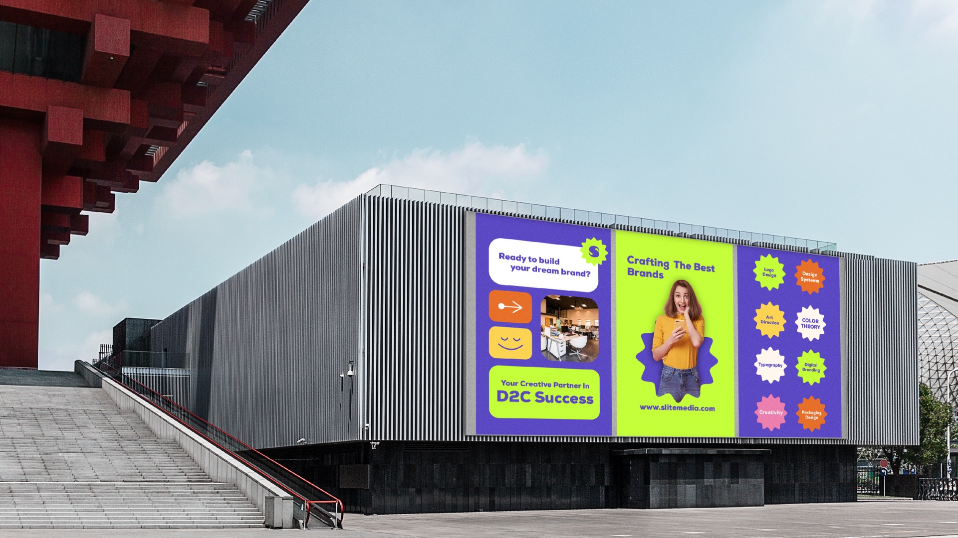 Three Slite Media panels on the facade of a large building