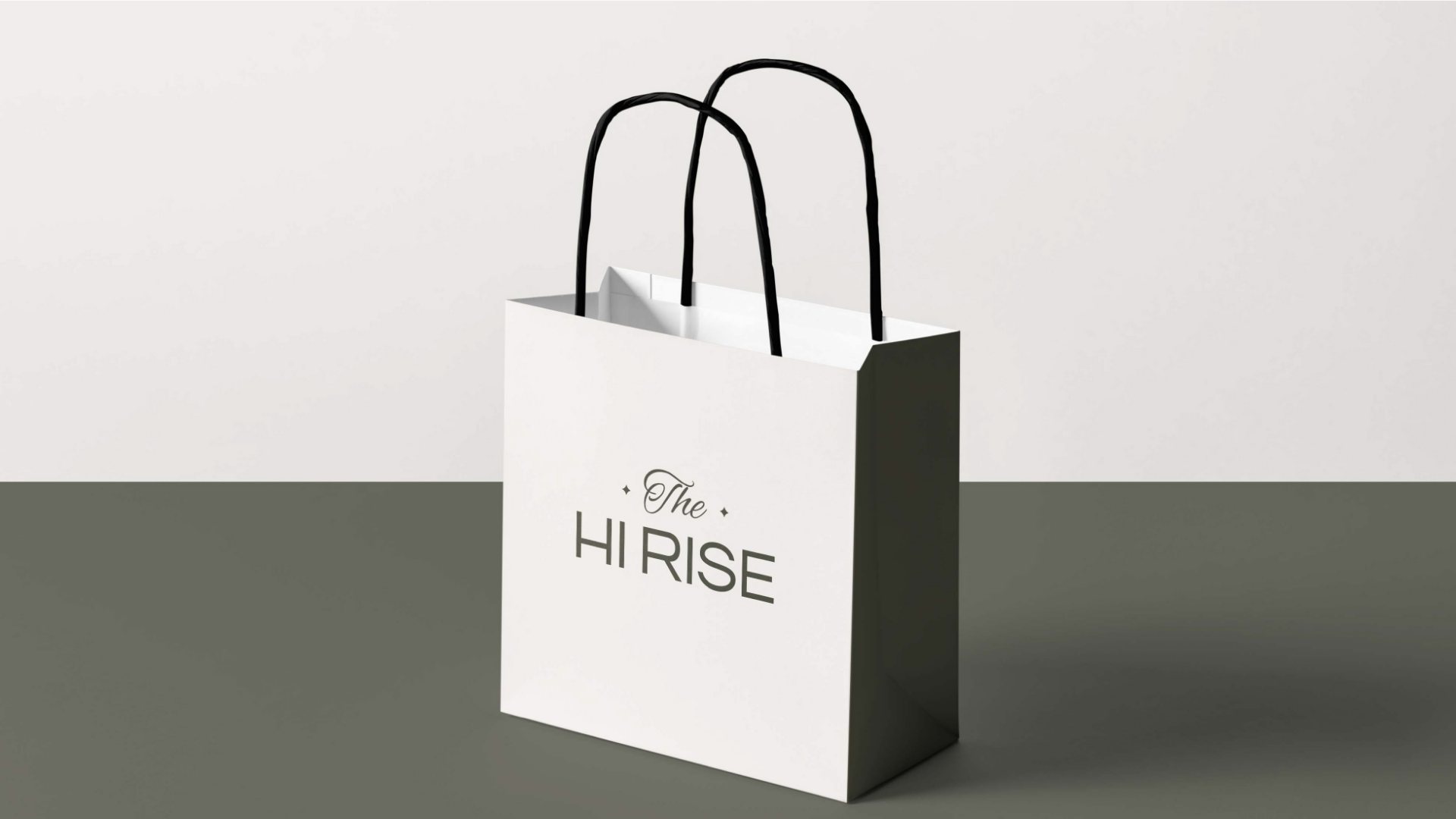 A white paper bag with the wordmark