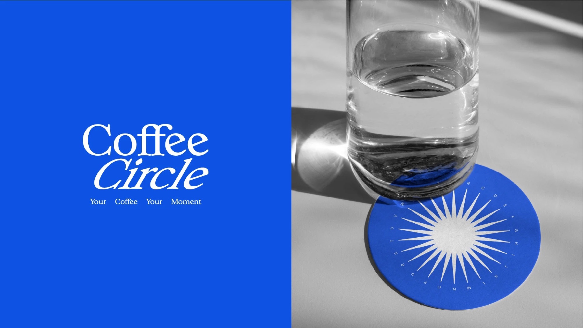 Blue wordmark panel and a coaster under a glass of water