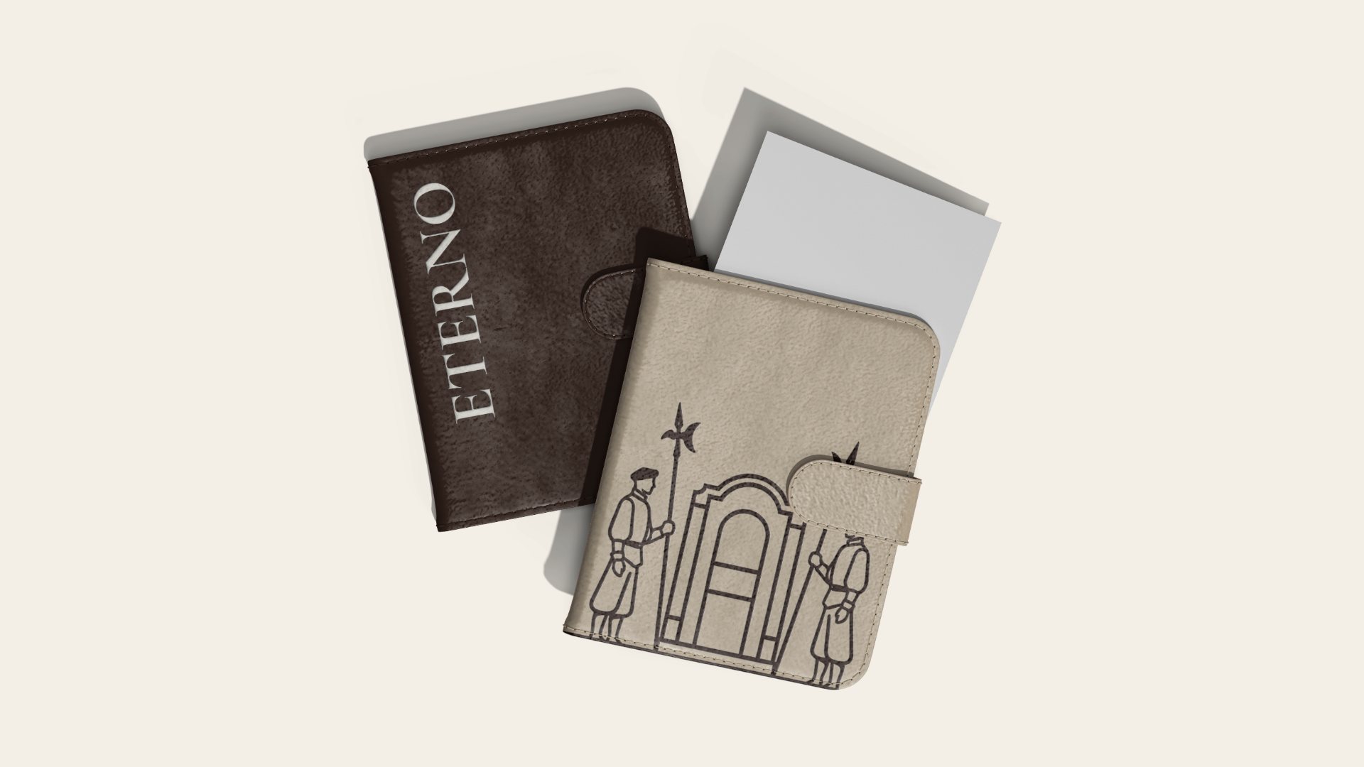 A leather notebook and cards with the Eterno crest
