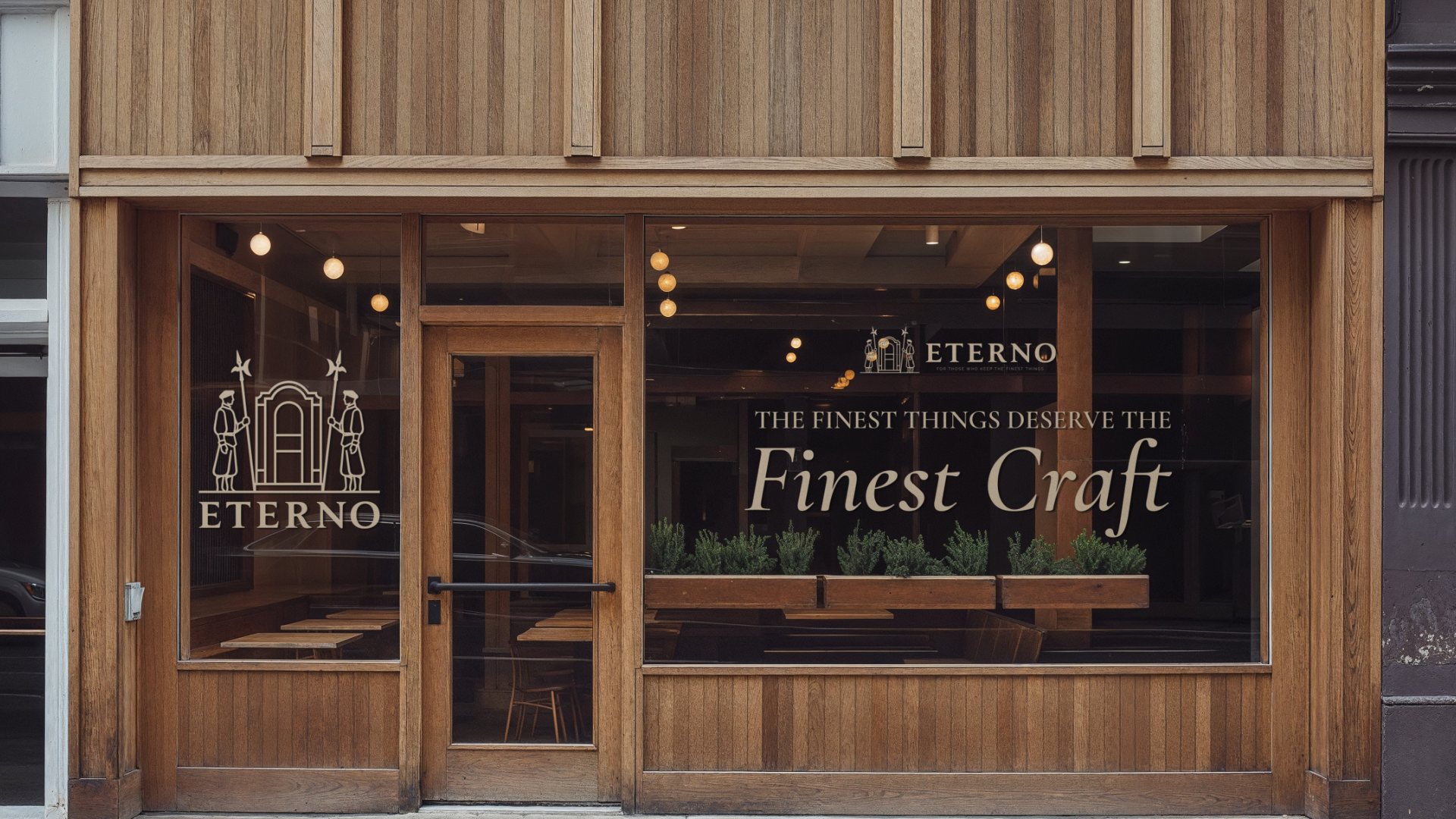 An Eterno shopfront in warm wood with the crest on the glass and the line The Finest Craft