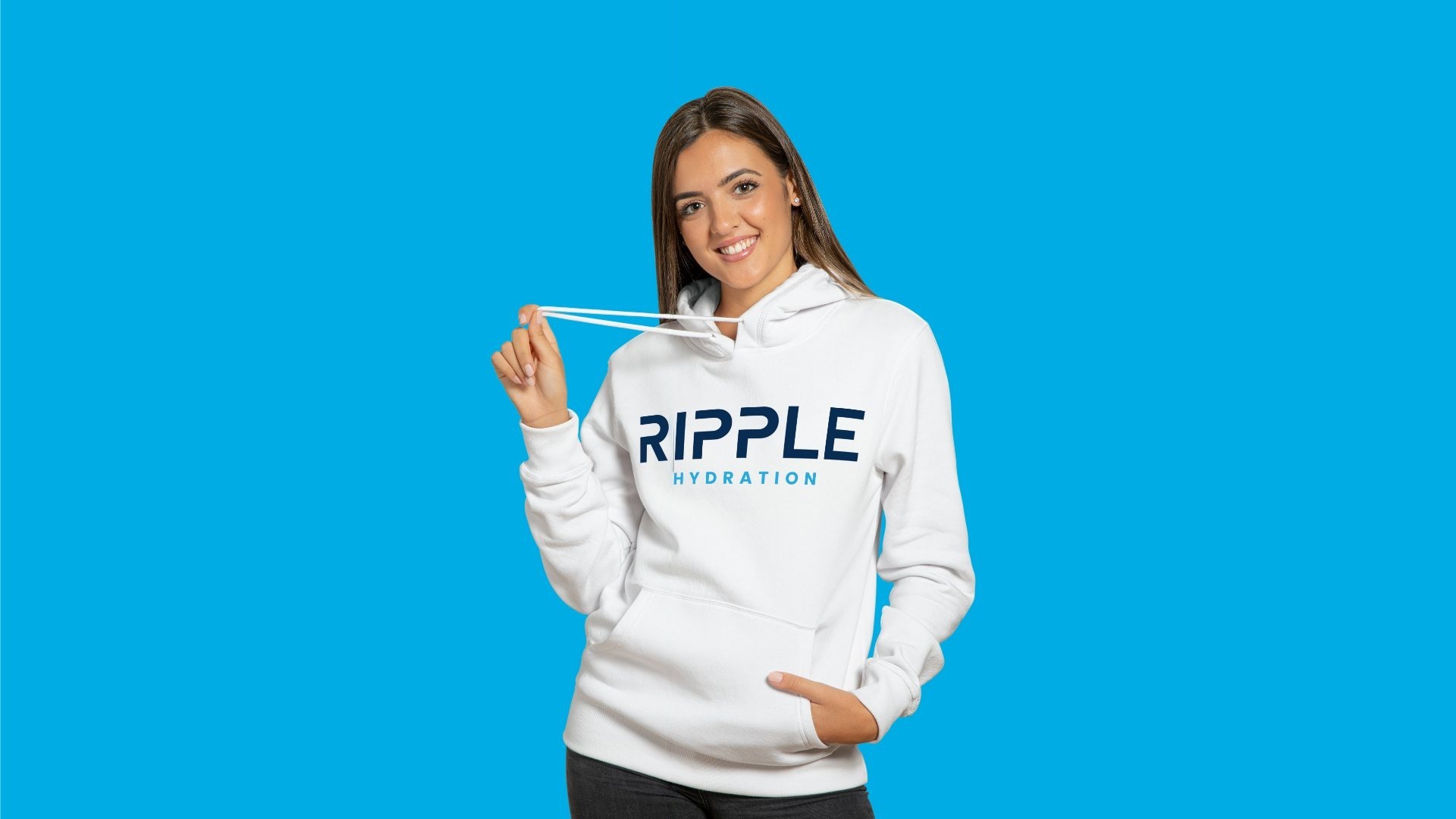 A woman in a white Ripple hoodie